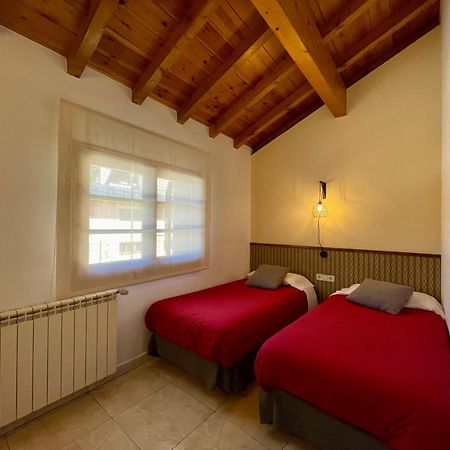 Aparthotel Les Corts Ливия Екстериор снимка